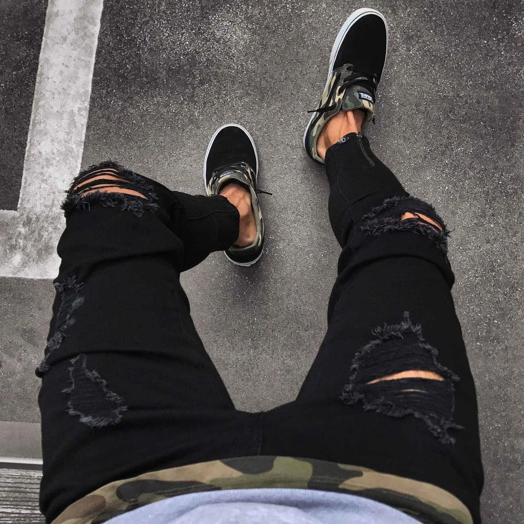 Herrenjeans Neue schwarze zerrissene Stretch-Reißverschluss-Trendhose für Männer