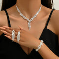 4PC Damen Mode Kupfer Klaue Kette Hohl Quaste Halskette Ohrringe Armband Schmuck-Set Hochzeit Bankett Party Festival geschenk