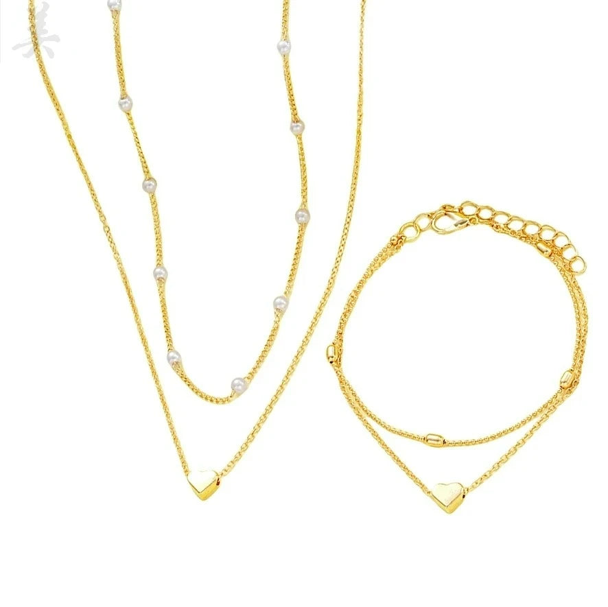 Modisches Schmuckset mit Imitationsperlen und Herzanhänger für Damen, Gold- und Silberfarben, runde Perlen, Halskette und Armband, Accessoires für den Alltag