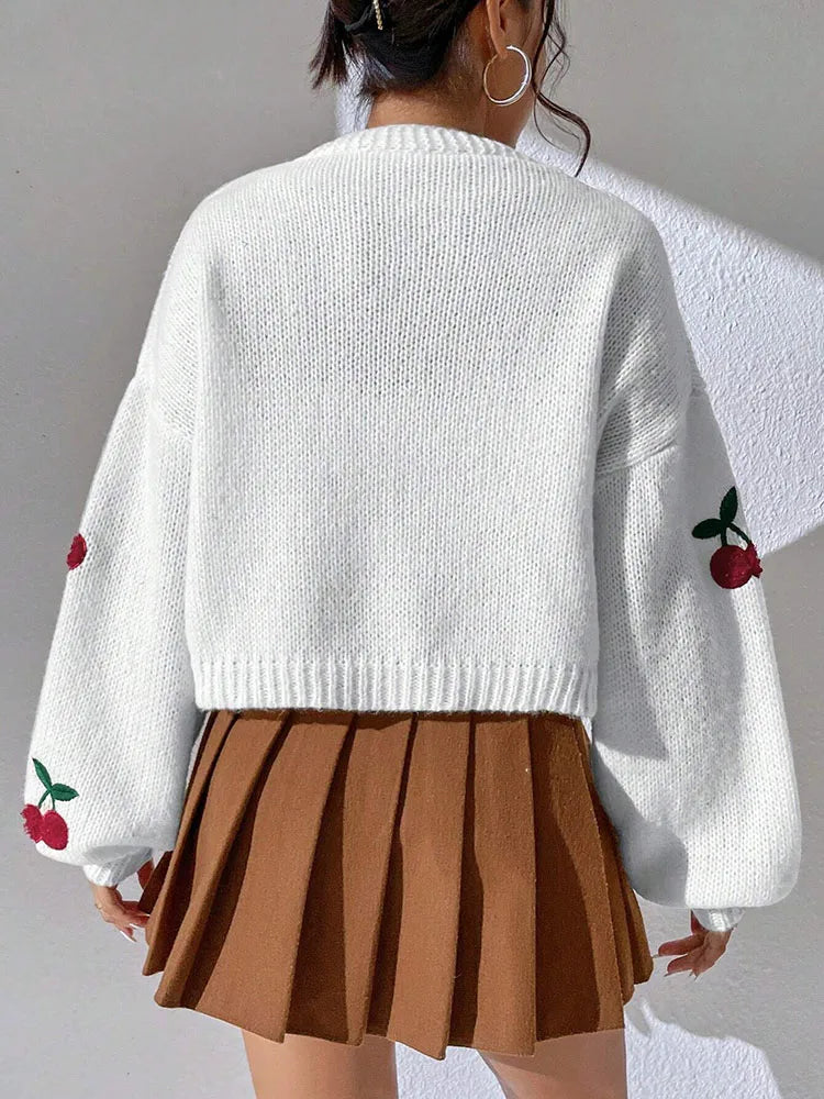 Modischer Strickjacke mit niedriger Schulter und Kirschstickmuster, Pendlerpullover, lockere Damenjacke, Strickpullover