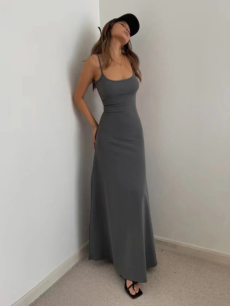 Sommer frauen neue stil modische einfache temperament schlinge lange backless dünne taille sexy süße würzige lange beiläufige kleid